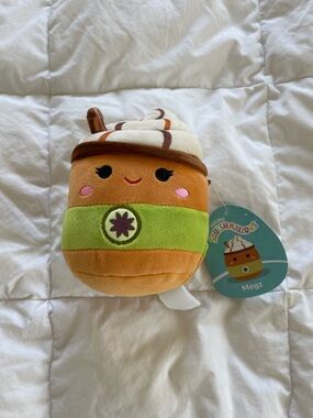 Squishmallows Megz Scented Orange Plush with Green Band and Cream Top